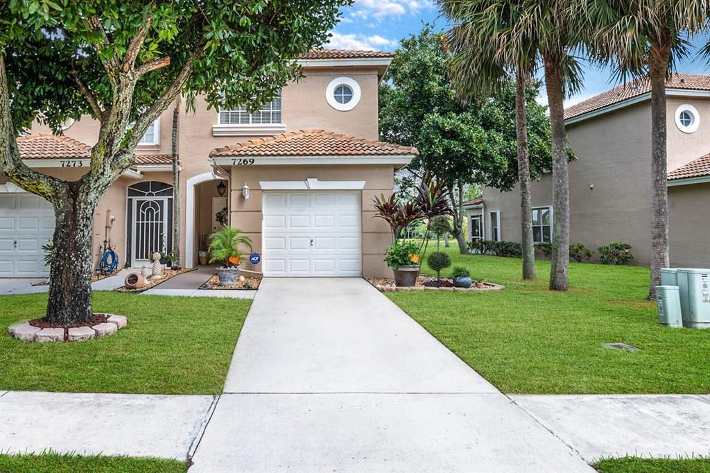 Photo of 7269 Smithbrooke Drive Dr, Lake Worth Beach, FL 33467 (MLS # R10754941)