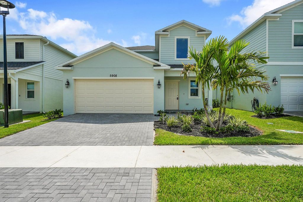 Photo of 5908 NW Fairfox Way, Port Saint Lucie, FL 34987 (MLS # R11094706)