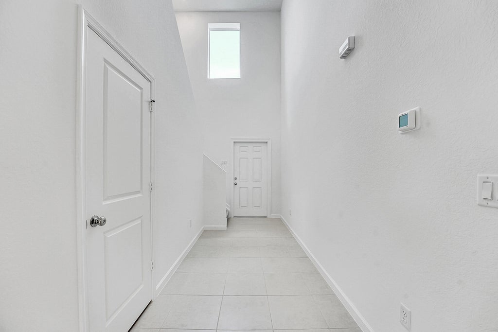 Photo of 5908 NW Fairfox Way, Port Saint Lucie, FL 34987 (MLS # R11094706)