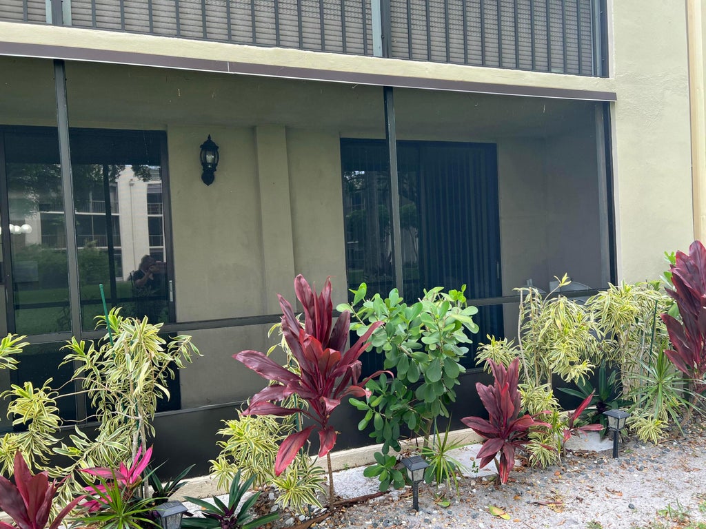 Photo of 5220 LAS VERDES Circle #101, Delray Beach, FL 33484 (MLS # B26078604)