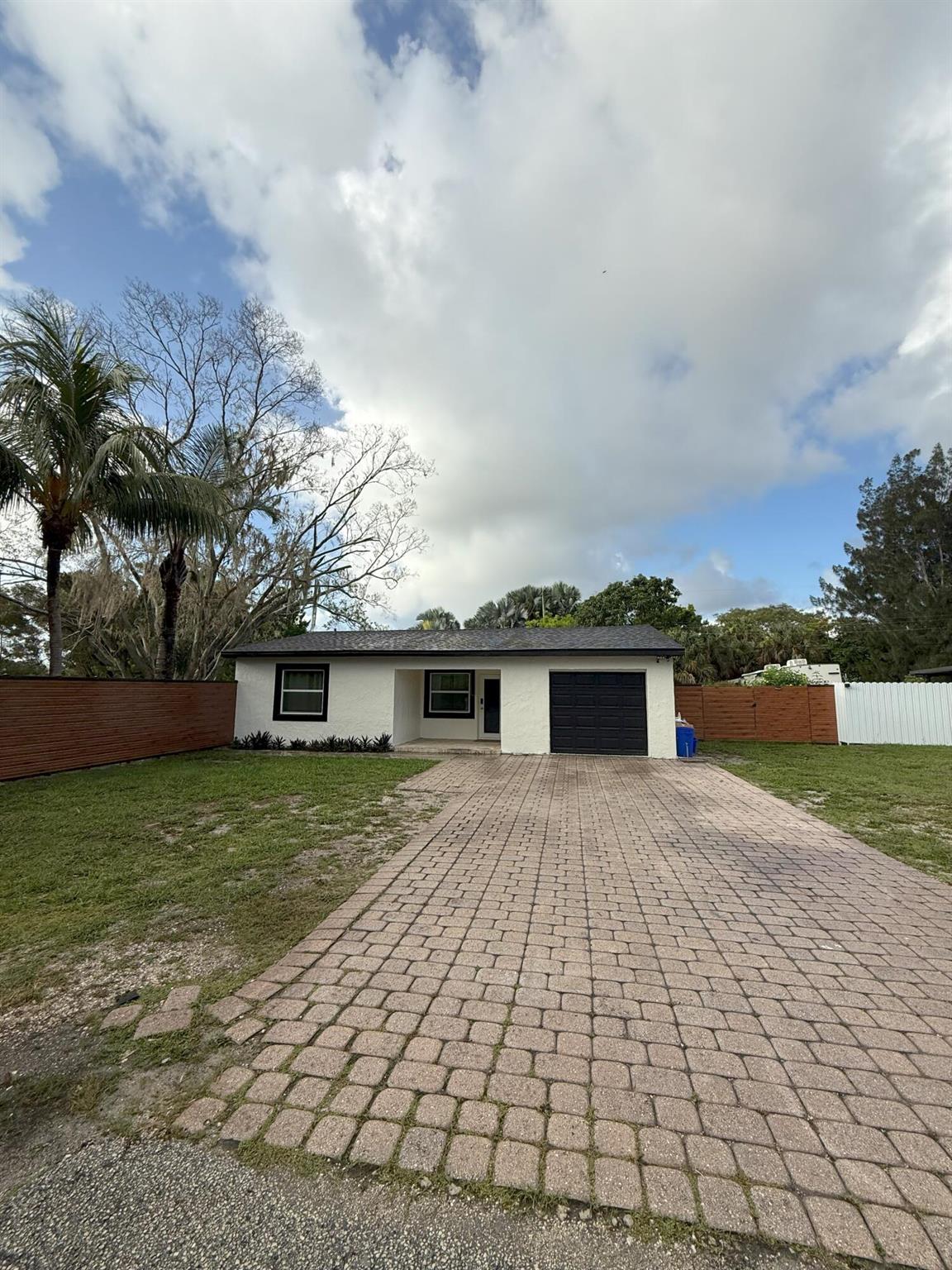 MOTIVATED SELLER! BRING ANY & ALL OFFERS!! SELLER IS OFFERING $20,000 IN SELLER CONCESSIONS!Fully Renovated | 2025 Roof & Impact Windows | Huge Yard | Quiet Dead-End StreetBeautifully renovated and move-in ready! This home features a 2025 roof, 2025 impact windows and doors, 2025 drain field, 2024 water heater, and a brand new garage. Located at the end of a quiet dead-end street, offering privacy and peace. Inside boasts modern finishes and a functional layout. Outside, enjoy a massive yard with fruit trees, a shed, and tons of space to add a pool, gazebo, or deck. A true turnkey property with all major upgrades completed--MOTIVATED SELLER!