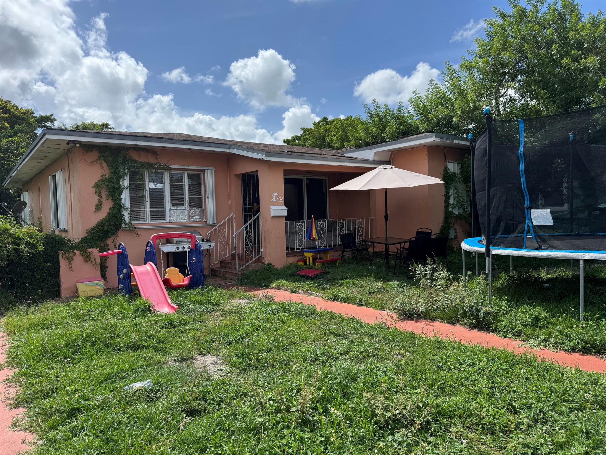 This home is a fantastic opportunity for the right buyer. The air conditioning system is only 2 years old, providing a great head start on comfort. The property offers a solid foundation for you to bring your vision to life. With some cosmetic updates to the flooring, kitchen cabinets, and a few other areas, this house can truly shine.