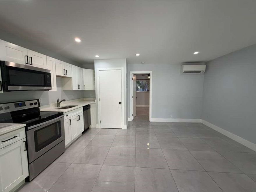 Now available for rent—this bright and updated 1-bedroom, 1-bathroom apartment in the heart of Victoria Park offers a clean, modern living space in a prime location. The kitchen features stainless steel appliances, quartz countertops, and tile flooring throughout. Includes an in-unit washer and dryer and an updated bathroom. Enjoy the comfort of a spacious walk-in closet and the convenience of an assigned parking spot. Pet-friendly and located just minutes from Las Olas, Downtown Fort Lauderdale, beaches, and major shopping.Bonus: The current water heater located in the closet is being upgraded to a tankless water heater, creating additional usable closet space for even more storage!