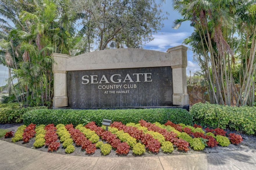 An exceptional opportunity to own this Unique & Rarely available 1864 sq. ft  3- Bedroom 2-Bath Corner Residence with   picturesque Lake & Golf Views!  Both the Primary and Guest Bedrooms include bonus sitting areas. This lovely home features Hurricane Impact Glass Sliders thru-out Creating Natural Light & Tranquility . Additional Enhancements include removed popcorn ceilings,  custom lighting, updated bathrm, & crown molding, new roof (2024), extra storage closet & covered parking spot, cable & Internet included. Walking-distance to the subdivision's pool & clubhouse. 3 miles from Atlantic Ave's renowned dining, shops & entertainment plus Delray's Beautiful Beaches.  Enjoy a guard gated community w/ OPTIONAL  MEMBERSHIP to Seagate Country Club at The Hamlet.