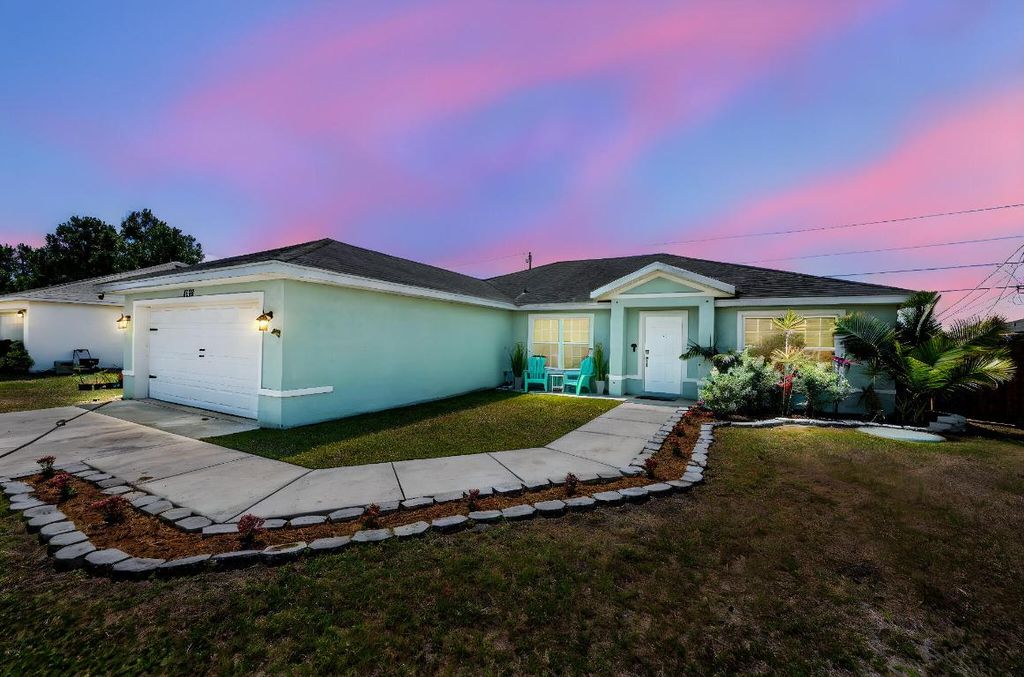 Photo of 1566 SW Andalusia Road, Port Saint Lucie, FL 34953 (MLS # R11087283)