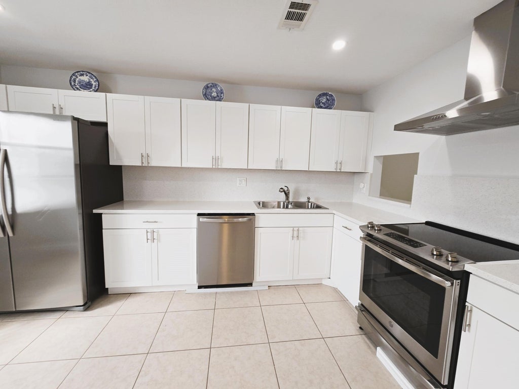 Photo of 2886 Fernley Drive E #40, West Palm Beach, FL 33415 (MLS # R10959591)