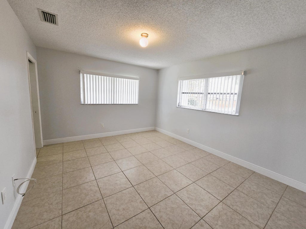 Photo of 2886 Fernley Drive E #40, West Palm Beach, FL 33415 (MLS # R10959591)