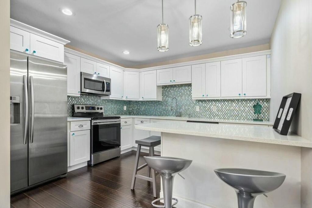 Photo of 905 NW 29th Avenue #D, Delray Beach, FL 33445 (MLS # R11083919)