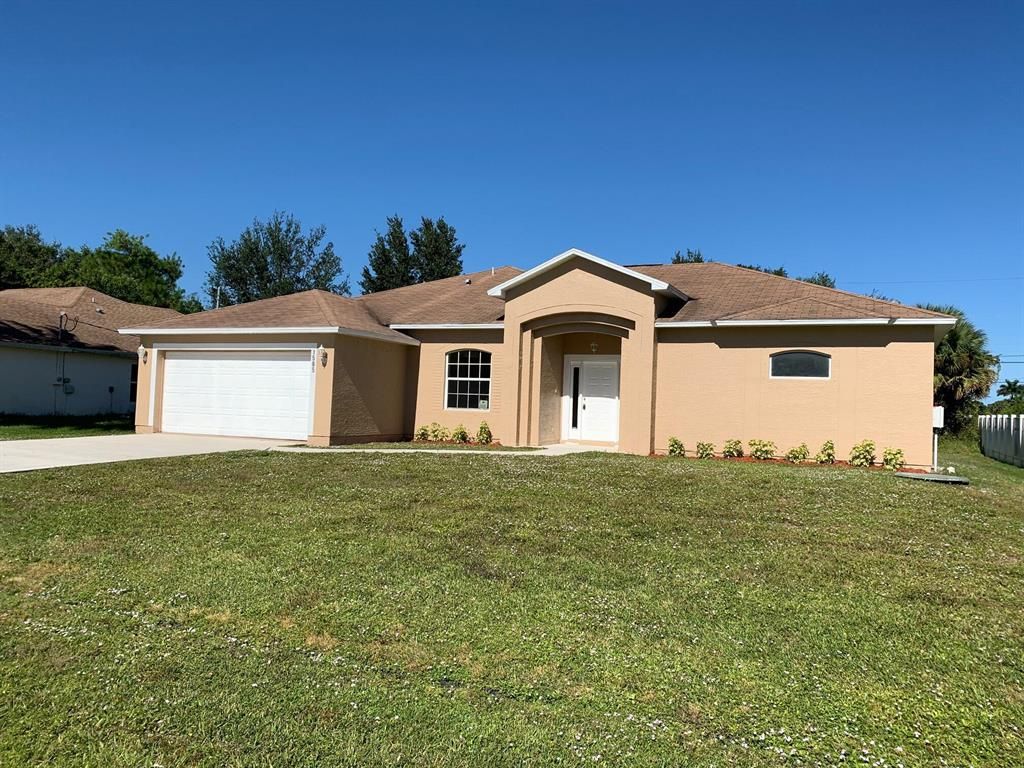 Photo of 1565 SW Underwood Avenue Ave, Port St Lucie, FL 34953 (MLS # R10757709)
