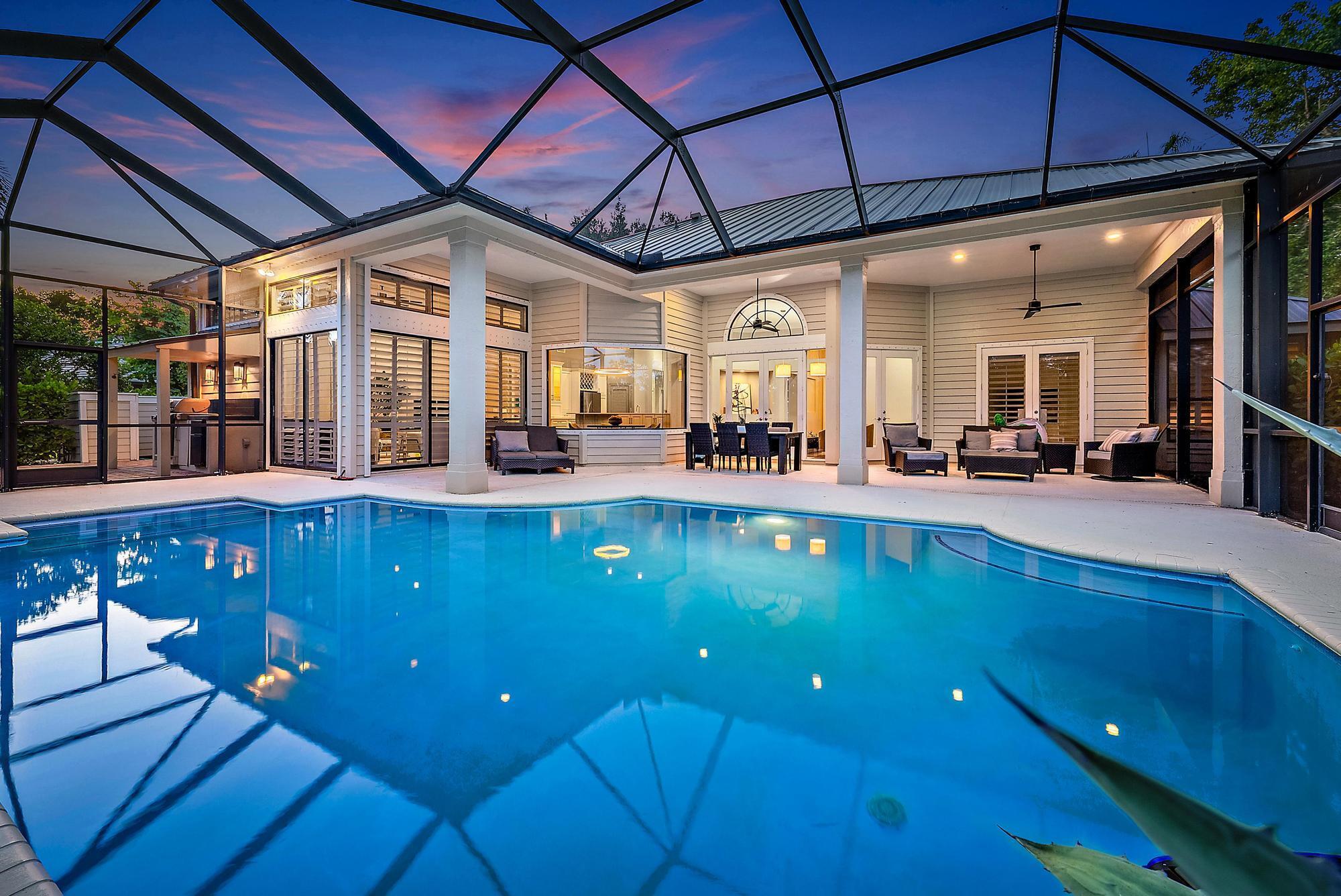 Nestled in the highly desirable Crane Creek community, this stunning residence embodies luxury and elegance throughout. Positioned on an expansive 1.4-acre lot with breathtaking golf course views, this fully renovated 5-bedroom, 4-bath home with a 3-car garage is truly a dream come true. Inside, you'll find a gracious, open layout designed for both comfort and effortless entertaining.The pool and patio create a true outdoor oasis. Set against lush, manicured landscaping, this inviting space features a sparkling pool and a fully equipped summer kitchen, perfect for entertaining. Inside, the home is adorned with timeless touches, including hardwood floors, crown molding, and plantation shutters.
