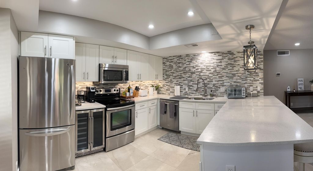 Photo of 431 Brackenwood Lane N, Palm Beach Gardens, FL 33418 (MLS # R11009962)