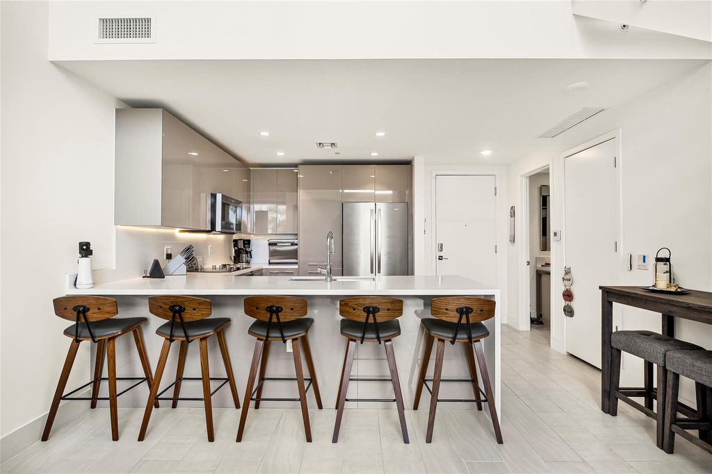 Photo of 2000 Metropica Way #216, Sunrise, FL 33323 (MLS # B26019867)