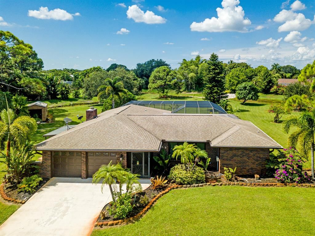 Photo of 2330 SE Delano Road Rd, Port Saint Lucie, FL 34952 (MLS # R10830959)