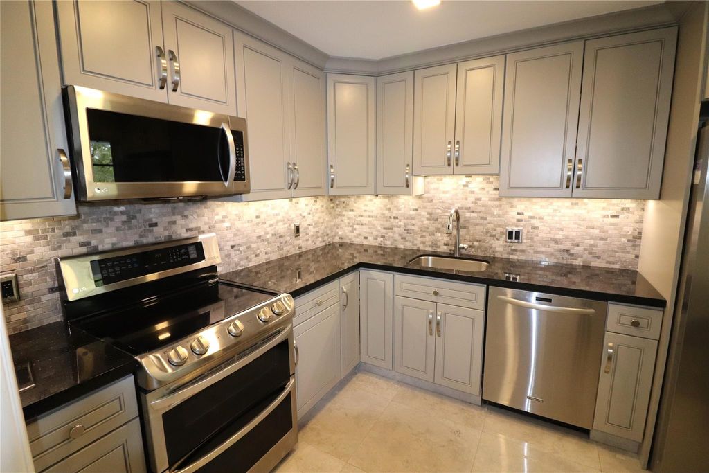 Photo of 4020 W Palm Aire Drive #412, Pompano Beach, FL 33069 (MLS # F10425528)