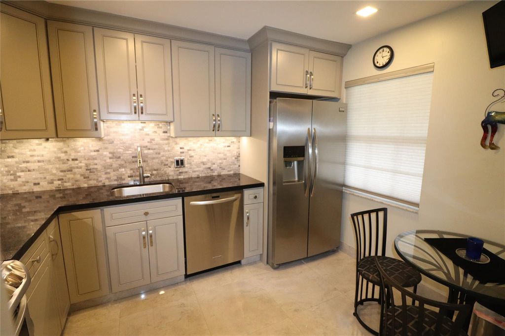 Photo of 4020 W Palm Aire Drive #412, Pompano Beach, FL 33069 (MLS # F10425528)