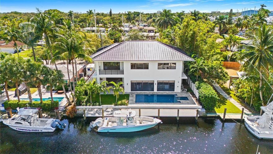 Welcome to 1317 Tangelo Isle, a stunning New Construction single-family home on the water. Enjoy 75 feet of canal-front with convenient ocean access, ideal for waterfront living at its finest. Outdoor spaces shine with a private pool and sun deck, perfect for soaking up the Florida sunshine. Offering 4,023 sq. ft. of elegant living space, this residence features a jaw-dropping kitchen with the ultimate in stylish accents. The thoughtful interior design elements blend impressive comfort and sophistication throughout. An open yet defined layout creates the perfect flow for entertaining or relaxing, enhanced by modern finishes and meticulous attention to detail. Experience the best of Fort Lauderdale luxury—where style, serenity, and prime location meet, at 1317 Tangelo Isle.