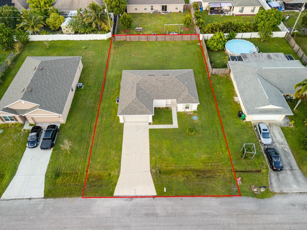 Photo of 517 SW Twig Avenue, Port Saint Lucie, FL 34983 (MLS # R11134310)