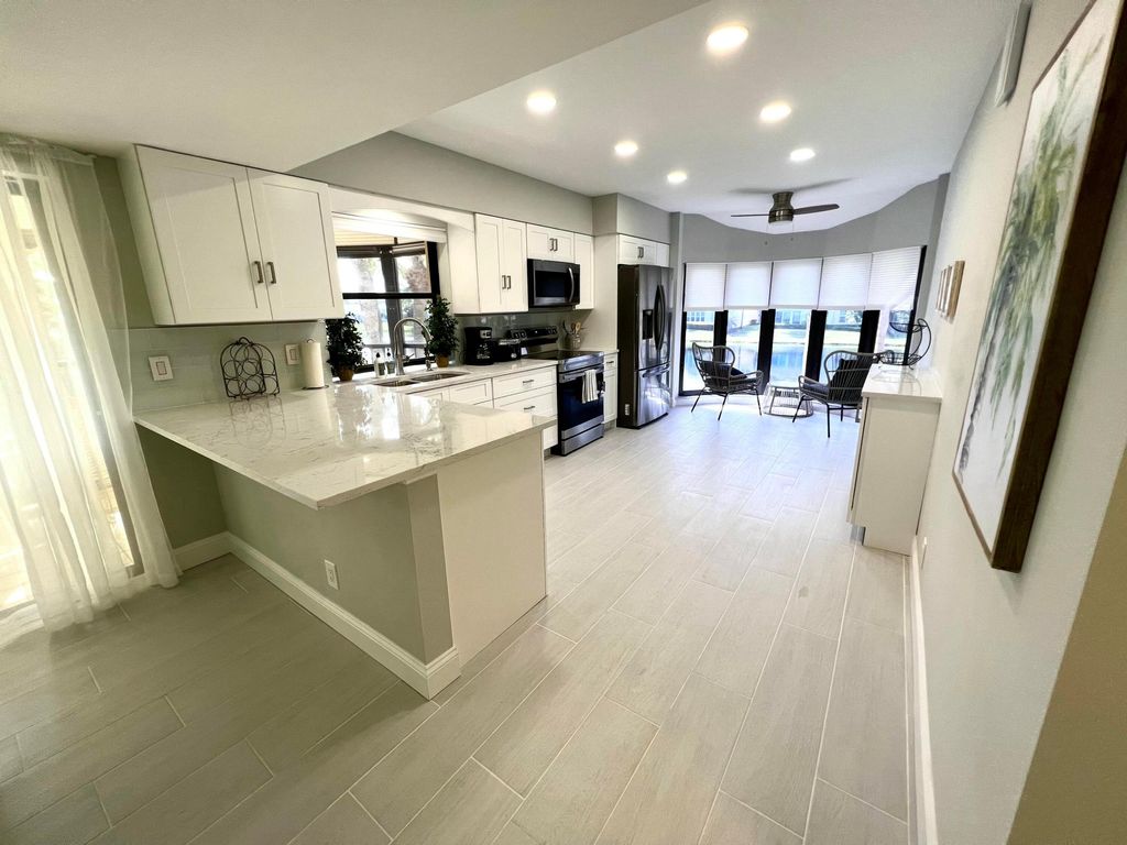 Photo of 17081 Waterbend Dr #Unit 229, Jupiter, FL 33477 (MLS # B26008364)