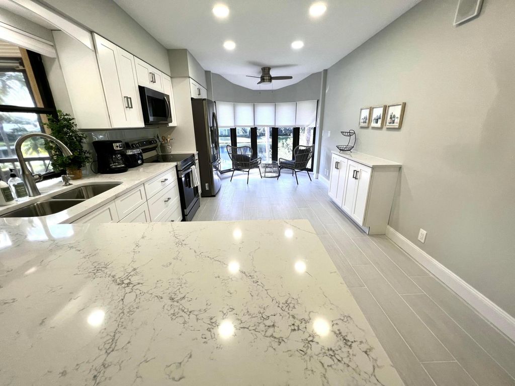 Photo of 17081 Waterbend Dr #Unit 229, Jupiter, FL 33477 (MLS # B26008364)