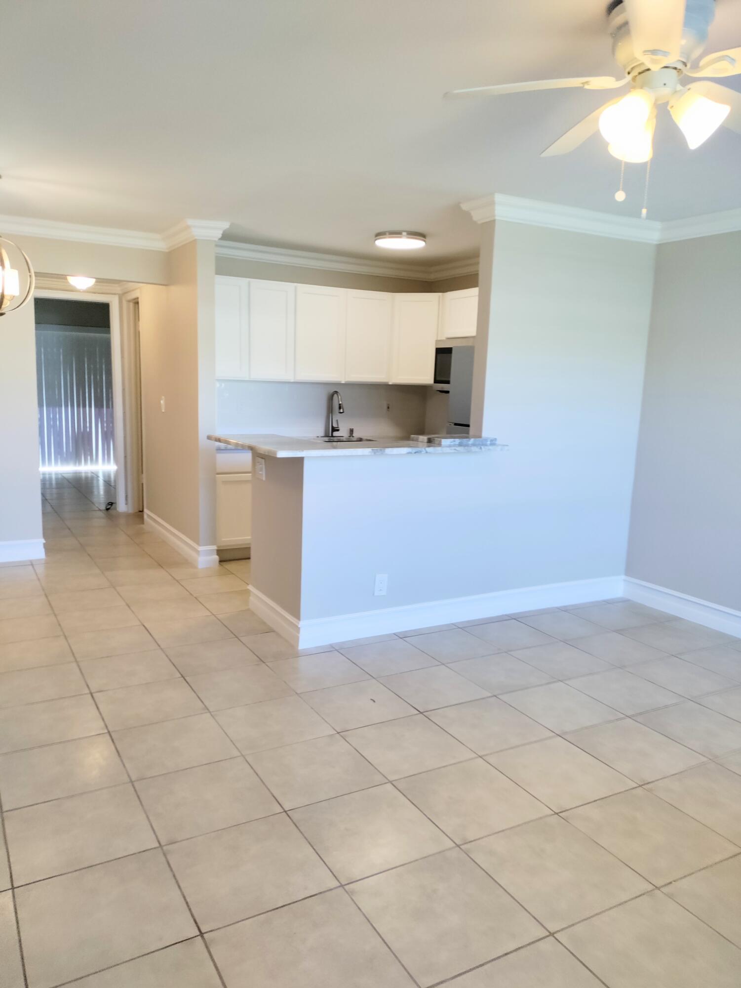 GREAT INTRACOASTAL COMMUNITY: This unit has completely remodeled kitchen and bath. The kitchen wall was opened to give you a more spacious feel. Beautiful Granite Countertops, Stainless steel Appliances and all new fixtures. Master suite complete with a serene Garden View, sit on the back patio and enjoy the breeze. Utilities included This is a very active 55+ community with full Amenities Including Pool, Bocce Ball, Shuffleboard courts, Weekly cook outs at Th Grilling Area, Club House, Walk the catwalk Along The intracoastal and watch the boats go boor Drop a line for Fishing. Only minutes to Beach, Day Shopping, grocery storeRestaurants & Marina!
