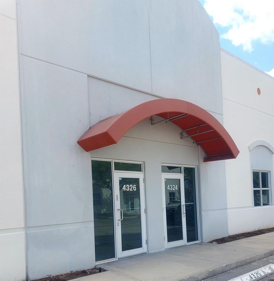 Beautiful light industrial condo - 2030 SF with 2 offices and 2 restrooms already built.  21st Century construction with all concrete building - even the roof - impact resistant storefront and windows, oversized overhead door in the warehouse area, etc. 29 foot-wide space provides ample space for distribution, contractor warehouse, storage, etc.
$600 per month condo fee includes property insurance and all exterior maintenance.