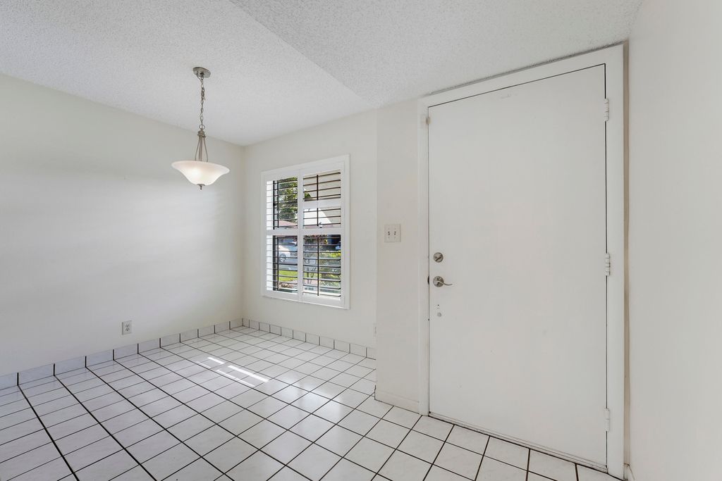 Photo of 13383 Pineapple Palm Court #A, Delray Beach, FL 33484 (MLS # B26020613)