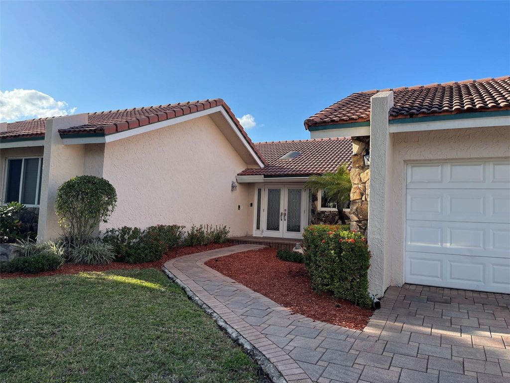 Photo of 8841 SW 8th Street, Plantation, FL 33324 (MLS # F10479250)
