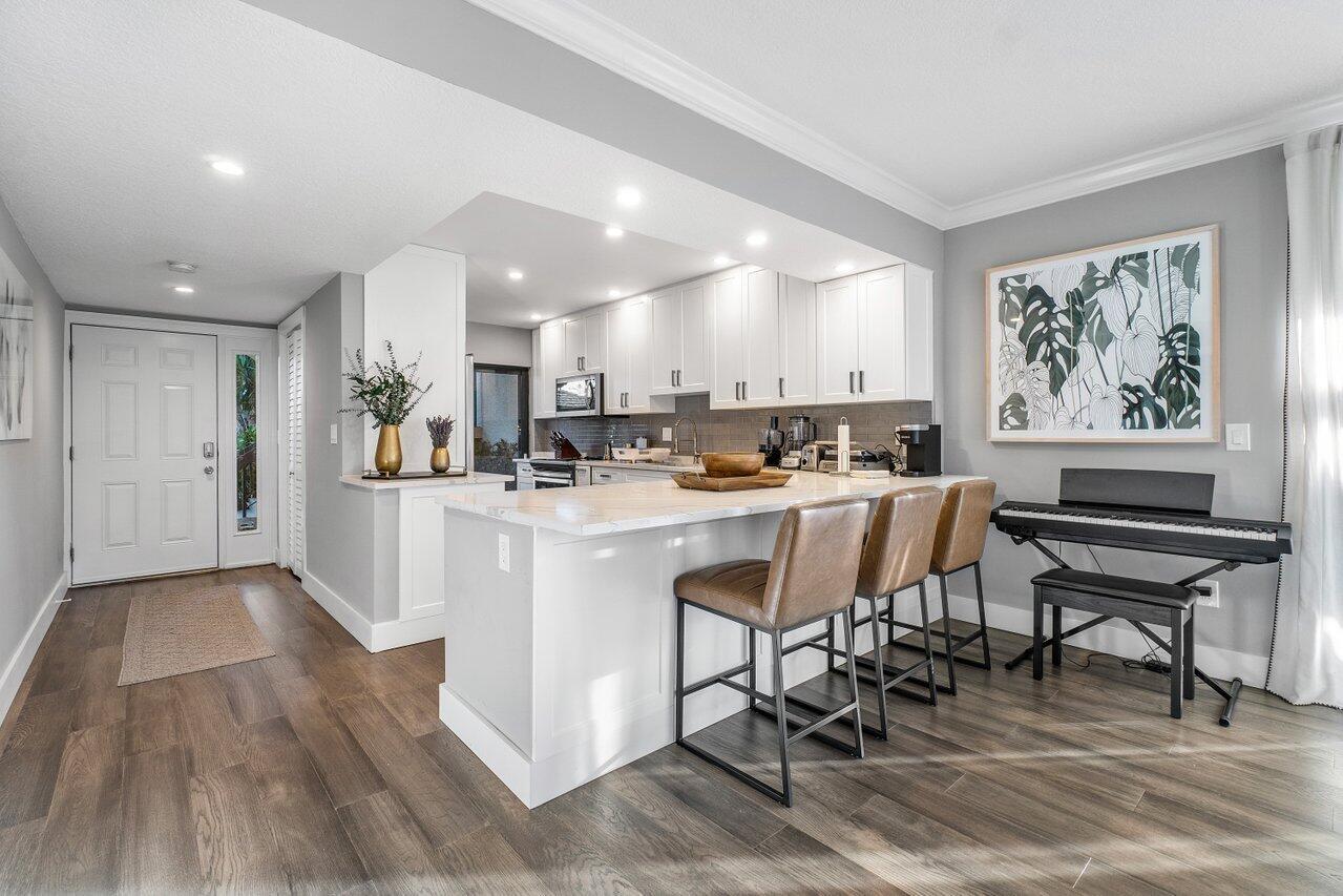 Enjoy the winter season inside this completely remodeled unit at the exclusive Palm Beach Polo Club. Just a few minutes away from WEF & Wellington International Equestrian venues, you can golf cart or even bike. The 3 bedrooms and 3 en suite bathrooms are fully equipped for your stay. Unit available off Season (April 15th), for $5500 per month.