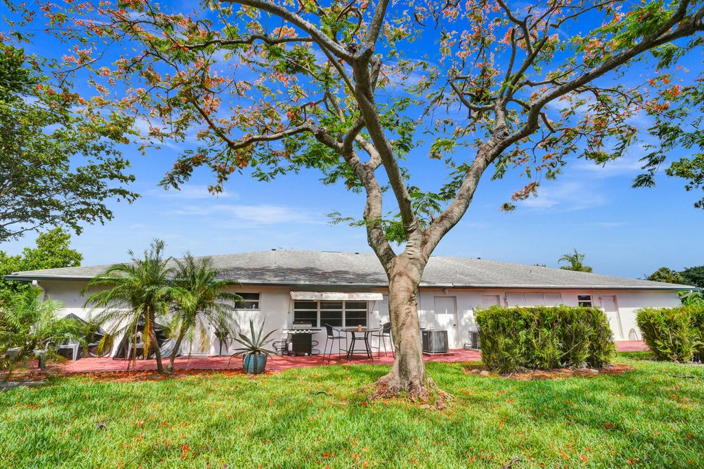 Photo of 1225 Club Drive W #C, Delray Beach, FL 33445 (MLS # R11053253)