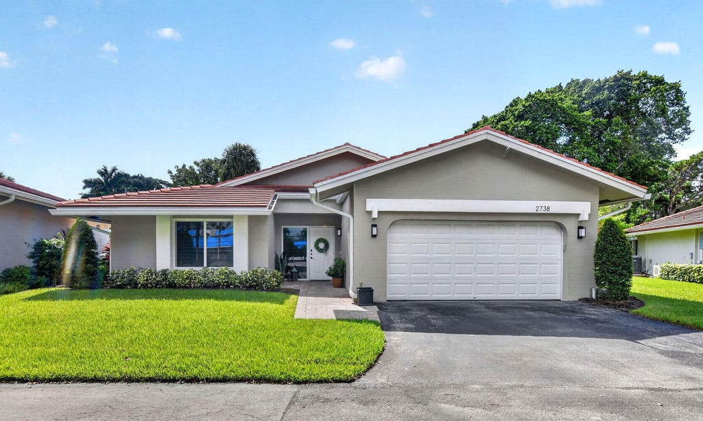 Photo of 2738 DEER CREEK KELLY BROOKE Lane, Deerfield Beach, FL 33442 (MLS # B26077791)
