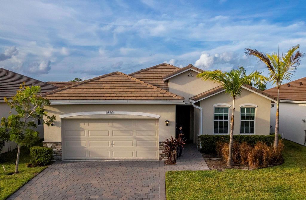 Photo of 4530 NW Exchange Avenue, Jensen Beach, FL 34957 (MLS # R11083337)