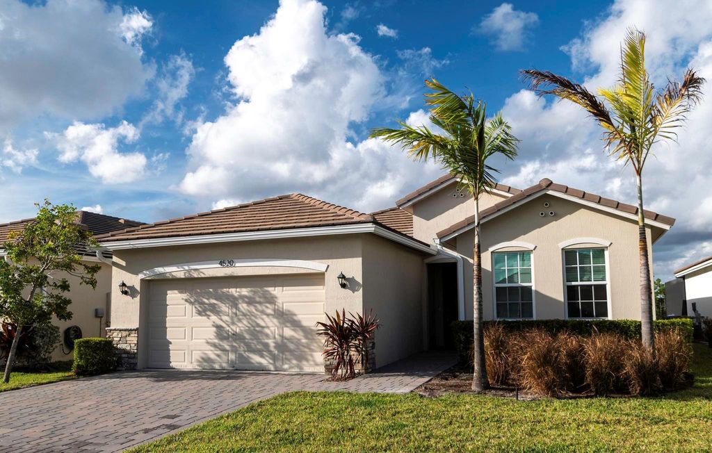 Photo of 4530 NW Exchange Avenue, Jensen Beach, FL 34957 (MLS # R11083337)