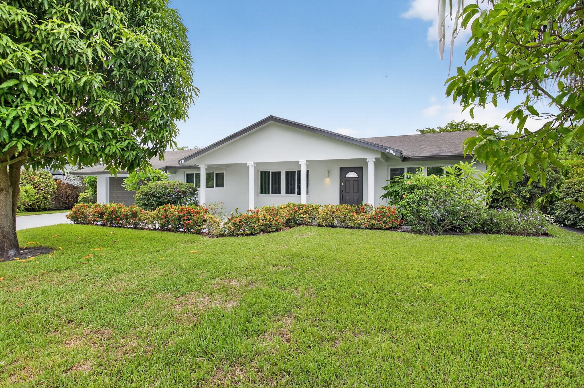 Beautiful single family pool home in Delray Beach! Home features 4 spacious bedrooms + a bonus room, 2,200+ square feet under air, fully upgraded, brand new kitchen w/ custom cabinets, new appliances, wine cooler and beautiful Quartz countertops. Brand new bathrooms, custom LED lighting all throughout the home, spacious walk-in closet in master bedroom w/ custom powder room. This home offers the perfect blend of luxury, convenience and privacy. 2 car garage plus oversized driveway, hurricane impact windows, big pool patio and large backyard (over 11,000 sqft LOT) with fruit trees and a garden oasis for privacy. Ideal for entertainment and summer vibes all year round! *LAWN, POOL MAINTENANCE AND WATER SERVICE INCLUDED* NO HOA. Pets are welcome. Book your private tour today before its gone