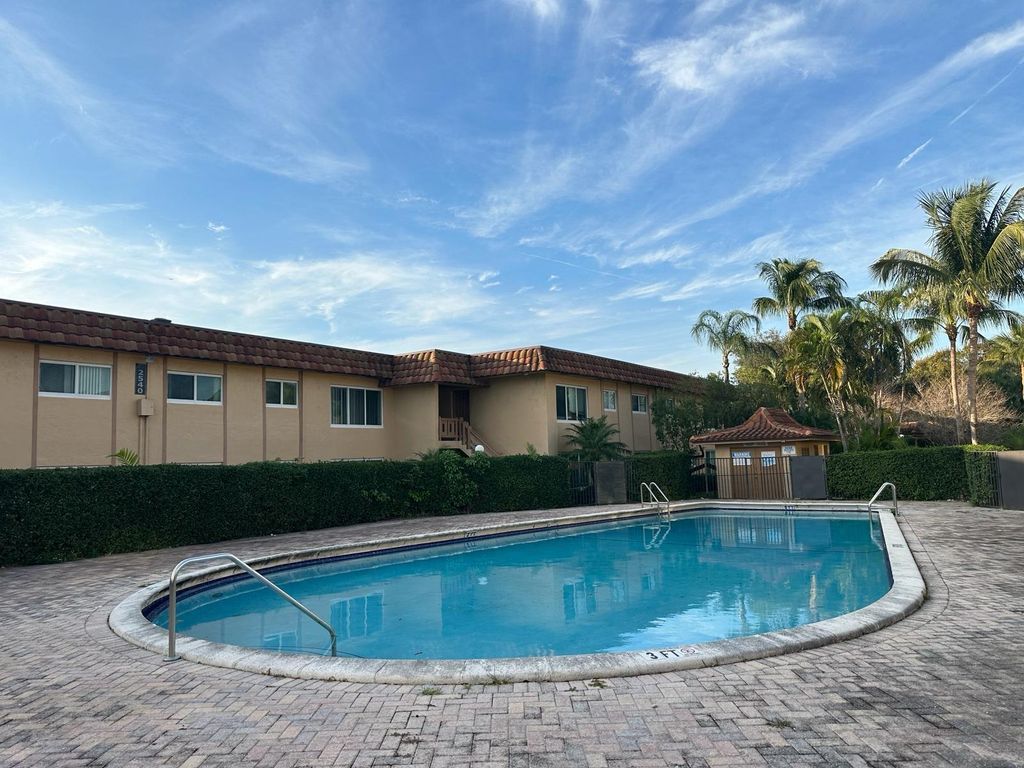 Photo of 2531 NW 39th Terrace #102, Lauderdale Lakes, FL 33311 (MLS # F10423606)