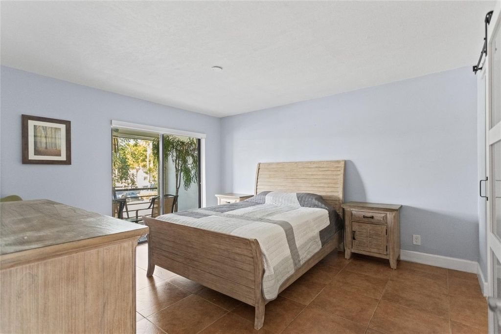 Photo of 2312 S Cypress Bend Drive #205, Pompano Beach, FL 33069 (MLS # F10540966)