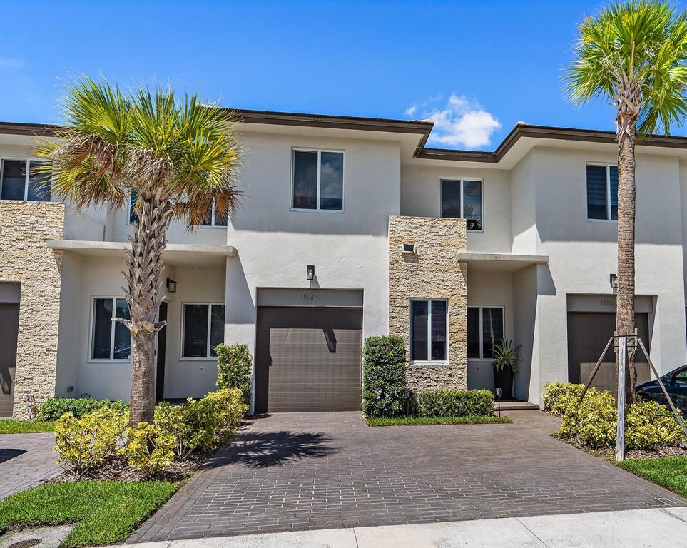 Stunning Modern & Custom Finishes Throughout! Many Features Include 2018 Built, Impact Glass Windows & Doors, Triple ''A'' Rated Wellington Schools, $50,000 In Designer Upgrades, Gated 24/7,HOA ONLY $115 / Month, 10'8 Ft Ceilings, Screened In Covered Patio Overlooking Gorgeous Private Preserve Views,Coffered Ceilings,Wet Bar,Upstairs Laundry Room. Master Suite Has Private Balcony, His & Her Closets, Double Sinks, Separate Tub & Shower. This New Desirable Greyson Community Offers Pool, Playground, Volleyball, Stocked Lake w/ Fishing Dock, Dog Park & Walking Trail to Restaurants & Shopping. 10 Min. to the Famous Okeeheelee Park - Known as Florida's Best w/ Over 1,700 Acres -Water Park, 3 Dog Parks, Equestrian Center/Trails, Nature Center, Five Custom Designed Lakes for Water Skiing, Fishing
