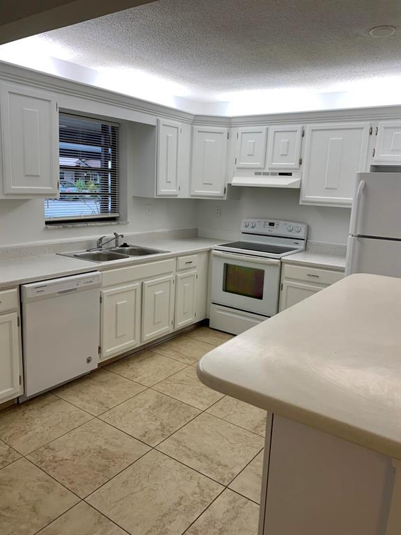 Beautiful unit with fresh paint throughout. Master bedroom has been remodeled with new tile, shower, toilet and vanity. New toilet in guest bath. New laminate floor in both bedrooms. Kitchen boasts a new dishwasher and countertop and is bright and cheery! Only a short walk to the pool. This condo is fresh and clean and ready to move in! Two year lease preferred.