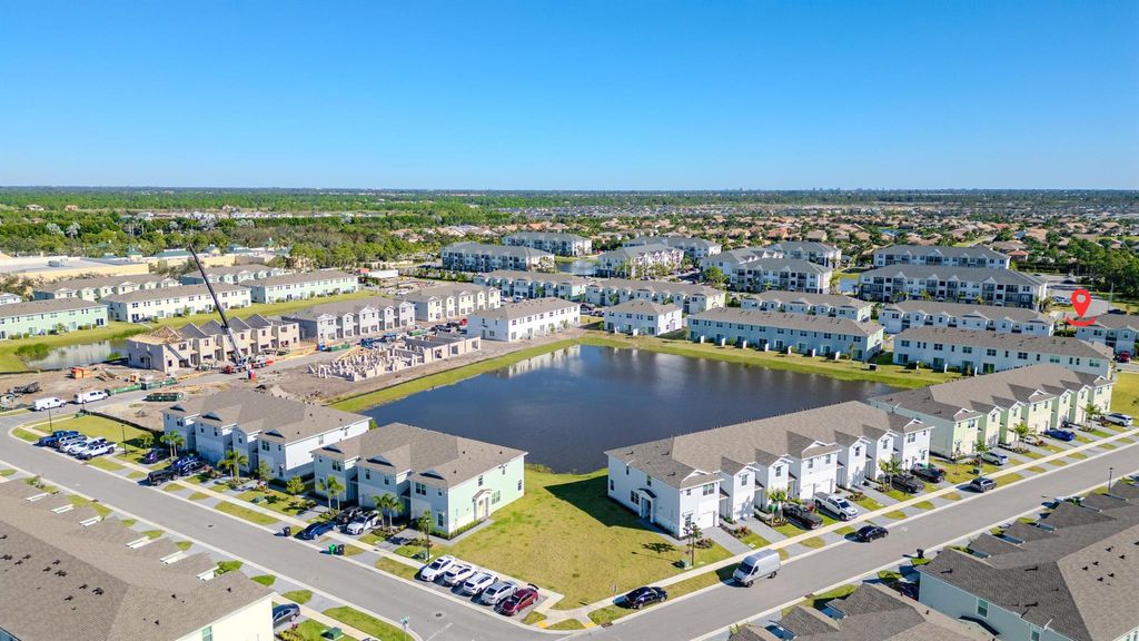 Photo of 411 SE Crossoak Lane, Port Saint Lucie, FL 34984 (MLS # R11092166)