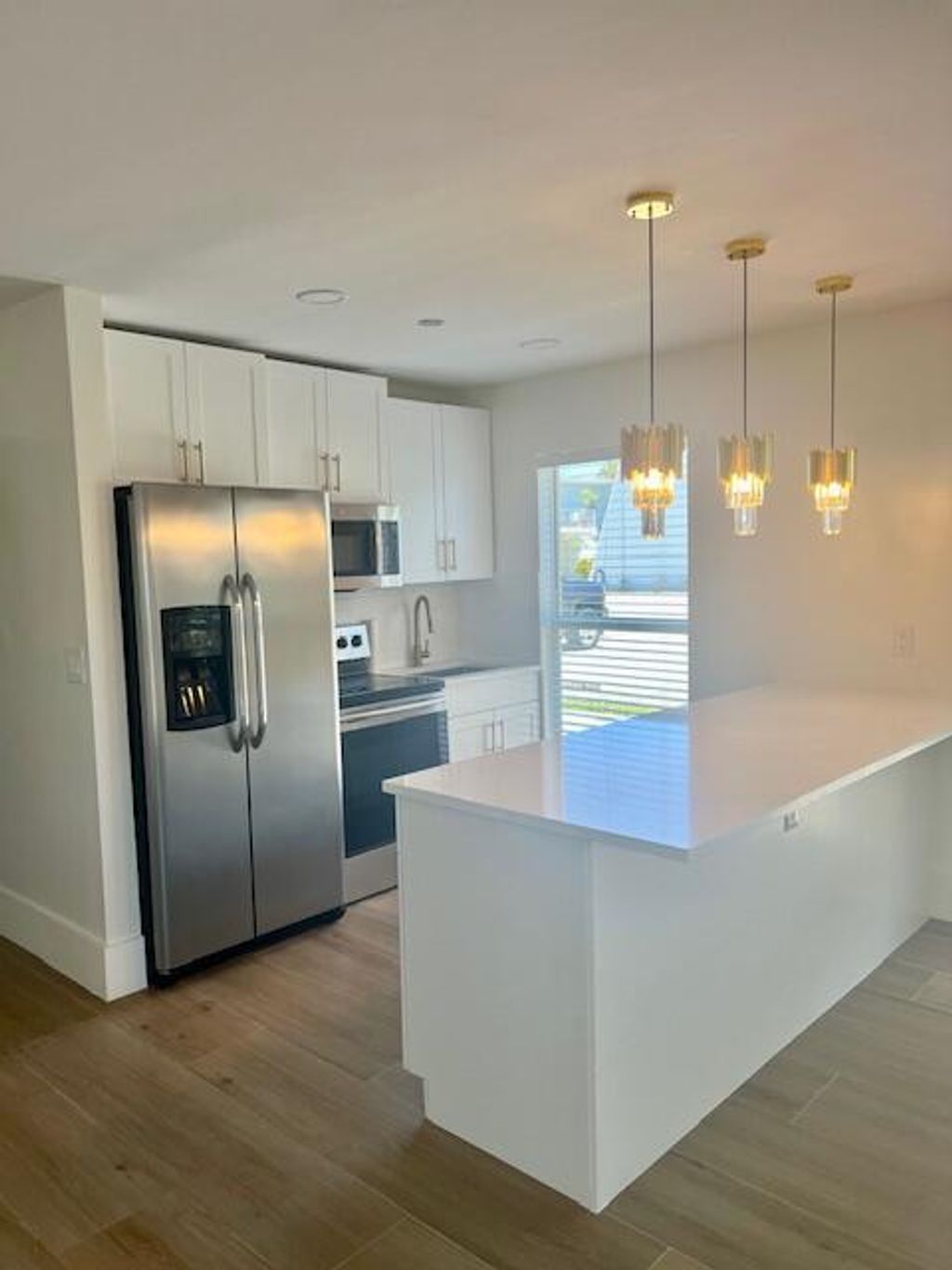 Photo of 727 Hummingbird Way #1, North Palm Beach, FL 33408 (MLS # B26022182)