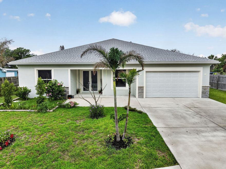 Brand-new construction in Port St. Lucie offering an impressive 3,400 living square feet of beautifully designed space! This stunning home features a modern open-concept layout with expansive living areas, soaring ceilings, and abundant natural light throughout. Designed for both comfort and entertaining, the spacious floor plan includes generously sized bedrooms, elegant finishes, and a stylish kitchen perfect for gatherings and everyday living. The luxurious primary suite offers a private retreat with ample space to relax and unwind. Enjoy the benefits of new construction with energy-efficient features and low-maintenance living. Conveniently located near shopping, dining, parks, schools, and major highways. Exceptional space, modern design, and endless possibilities await — schedule you