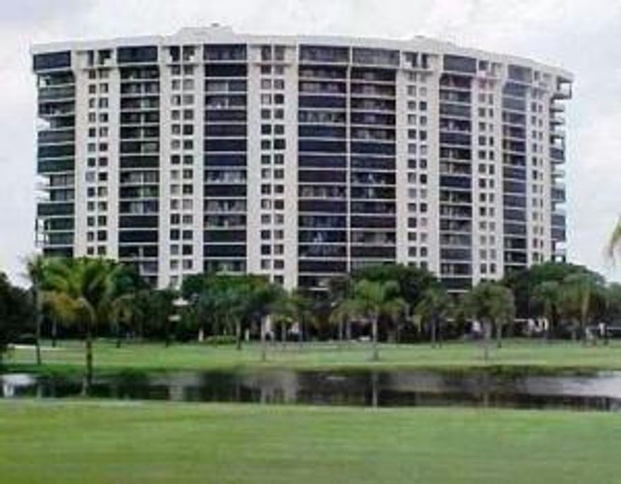 Spacious 2/2 with views that surpass the imagination. See the lights of the city by night and lake and golfcourse by day. Almost 2000 sq ft of living area in one of the most convenient locations in Palm Beach County. Golf outside your door and the new Outlet Mall Right across the street. Financially stable building with an active social room ,beautiful tropical pool are with spa,newly decorated lobby and halls. Extra storage on every floor. This is the perfect description of enjoy the Florida lifestyle. Ready to ad your own touches and enjoy!!!!