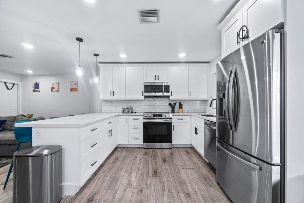 Photo of 4137 Rodgers Street, Palm Beach Gardens, FL 33410 (MLS # R11026206)