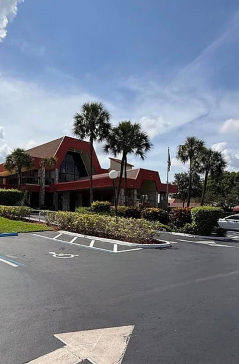 Photo of 3170 HOLIDAY SPRINGS Boulevard #6-309, Margate, FL 33063 (MLS # B26058552)