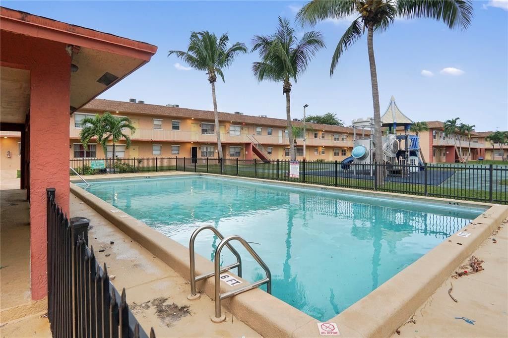 Photo of 101 NE 41st Street #F101, Oakland Park, FL 33334 (MLS # F10556376)