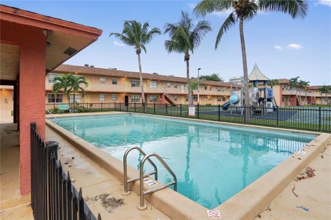 Tiny photo for 101 NE 41st Street #F101, Oakland Park, FL 33334 (MLS # F10556376)