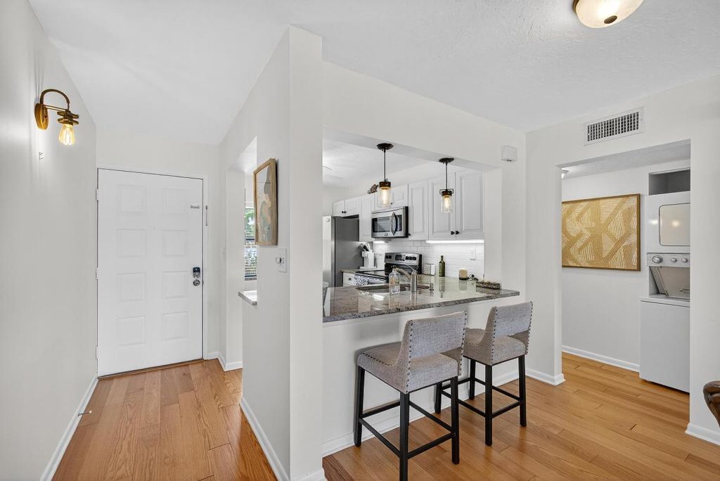 Photo of 12790 Briarlake 103 Drive #103, Palm Beach Gardens, FL 33418 (MLS # R11116409)