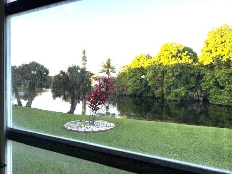 Beautiful tranquil setting on a winding lake overlooking the Century Village Nature Preserve. Very active 55+ community. Loads of athletic and social activities, including a fitness center and theater. First floor location with parking close to the front door. Freshly painted. Priced to sell quickly.