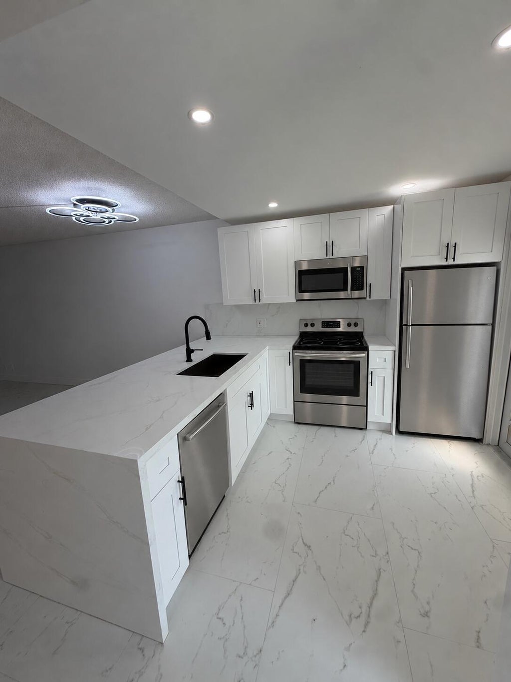 Photo of 2161 NE 1ST Court #105, Boynton Beach, FL 33435 (MLS # B26086217)