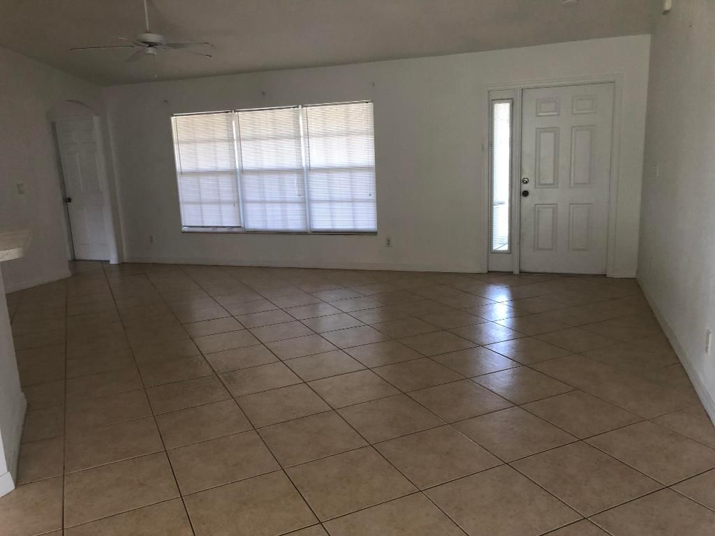 Photo of 714 SE Elwood Avenue, Port Saint Lucie, FL 34983 (MLS # R10952553)