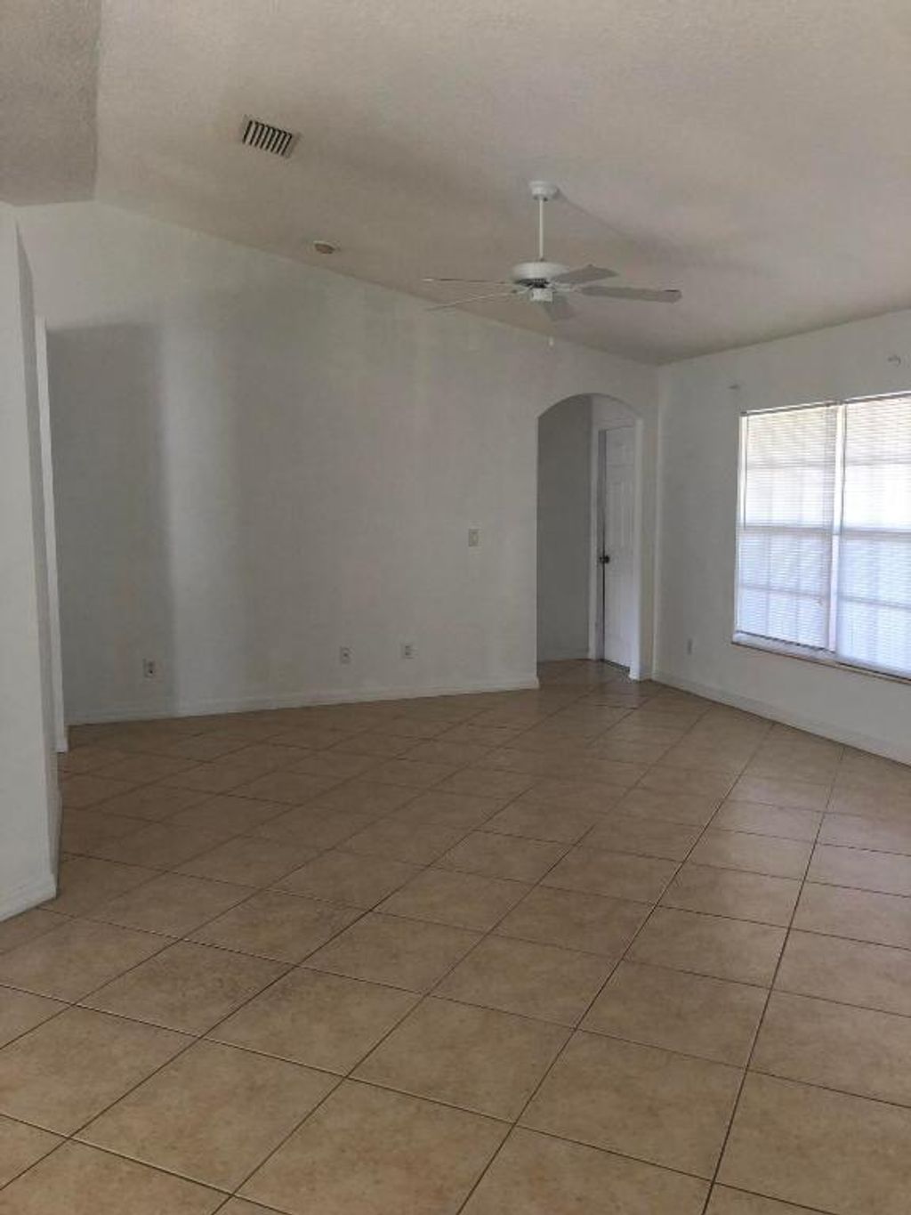 Photo of 714 SE Elwood Avenue, Port Saint Lucie, FL 34983 (MLS # R10952553)